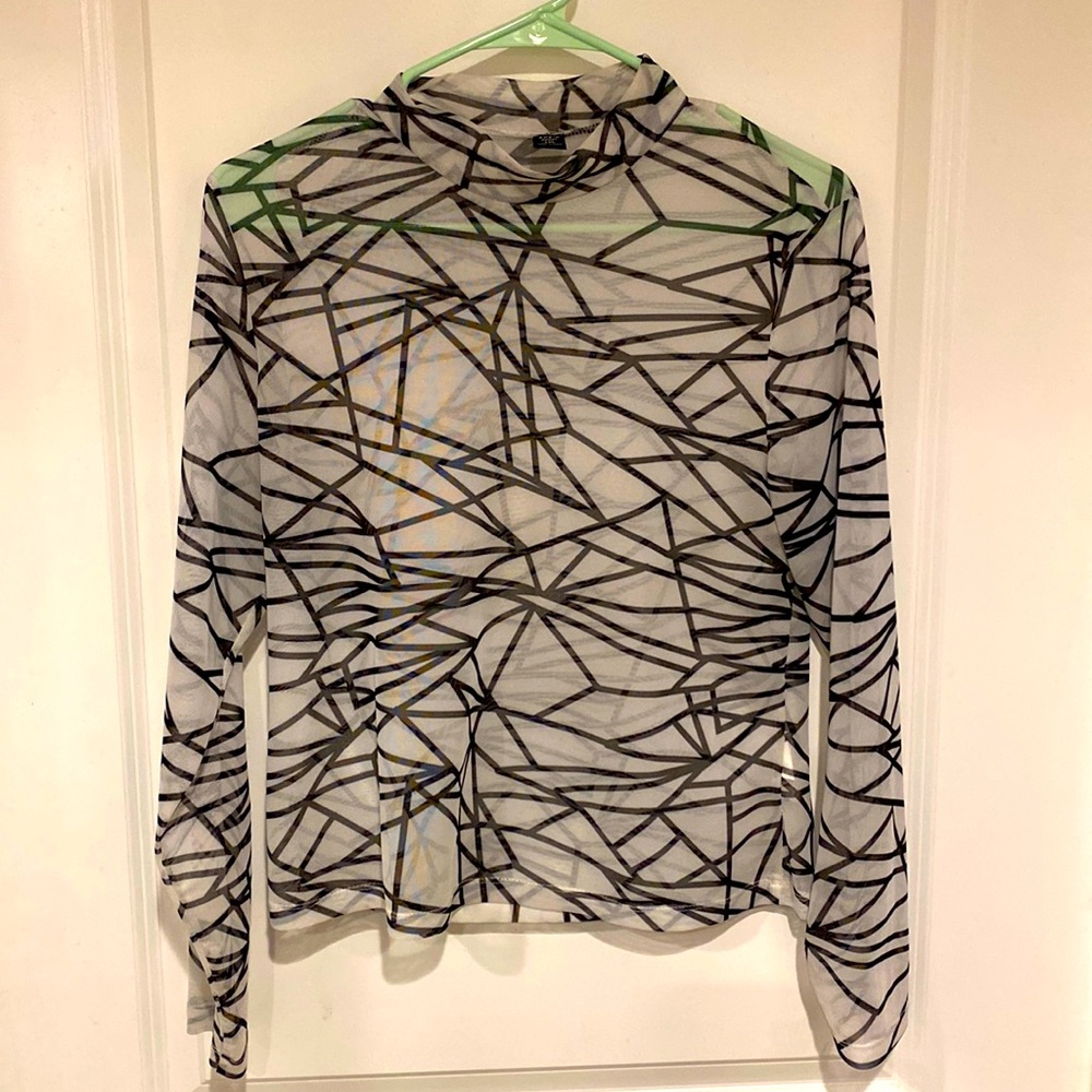 Mesh long sleeve with black shattered glass design